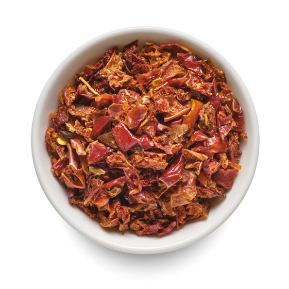 Close-up of Eva Spices red chilli flakes, showcasing their vibrant red color and coarse texture.