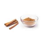 Eva Spices cinnamon powder in a small bowl, ready to add a warm, aromatic flavor to your dishes.