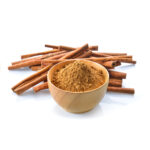 Eva Spices cinnamon powder in a small bowl, ready to add a warm, aromatic flavor to your dishes.