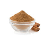 Eva Spices cinnamon powder in a small bowl, ready to add a warm, aromatic flavor to your dishes.